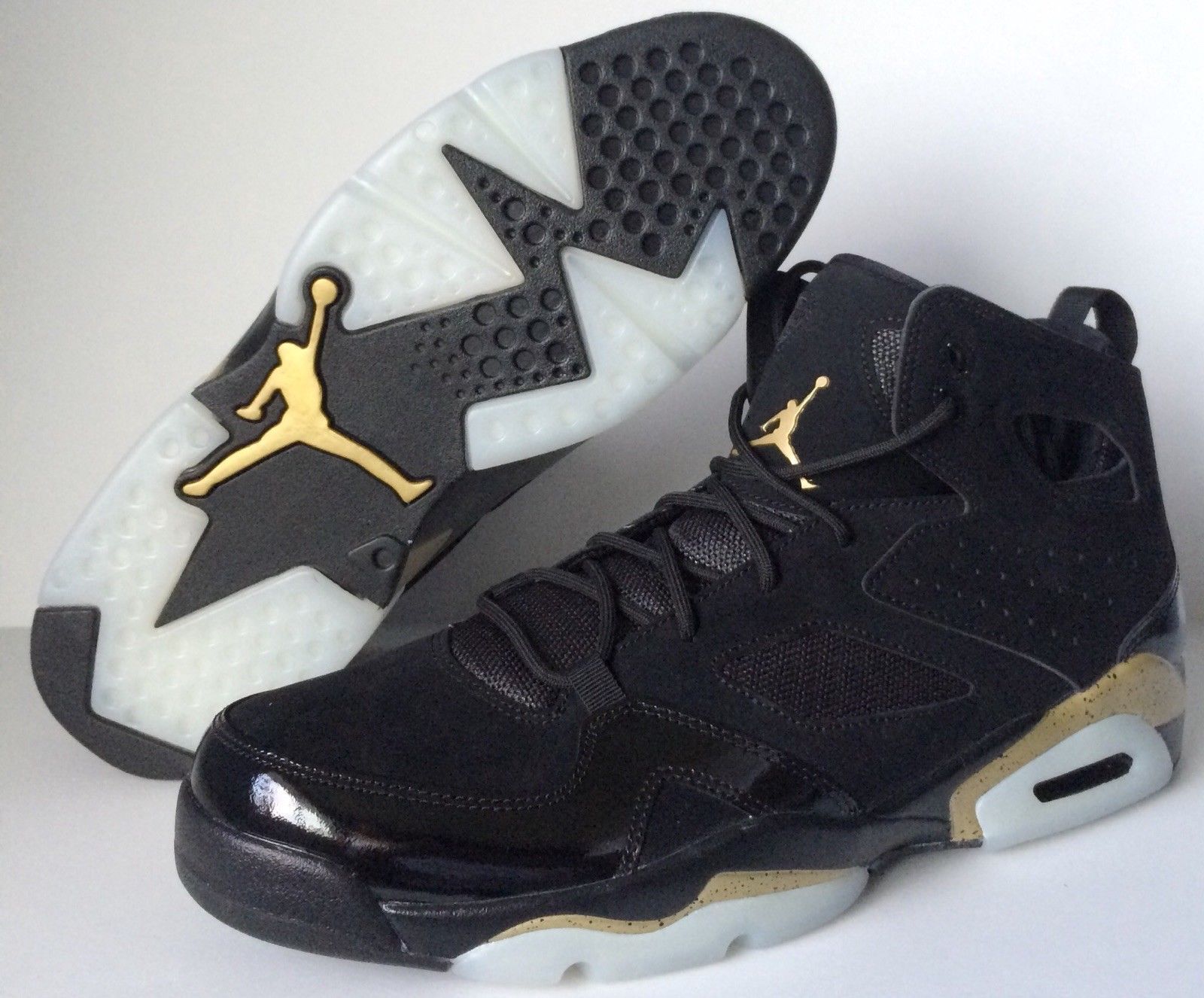 black and gold jordan flights