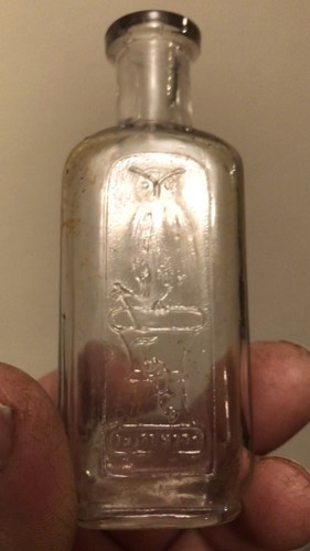 The Owl Drug Company Round Shoulderd Med Bottle