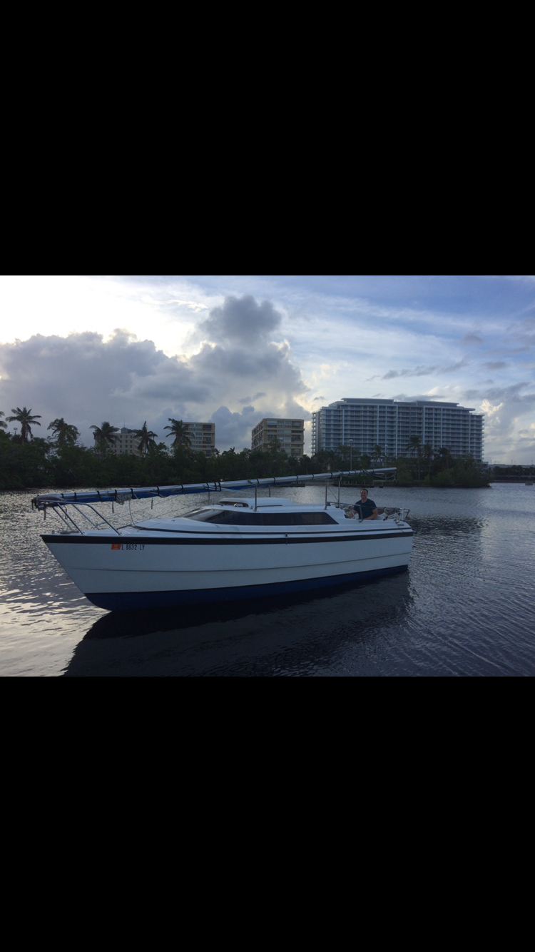 2002 MACGREGOR 26X sailboat and trailer with sails gps and 50 Suzuki four stroke