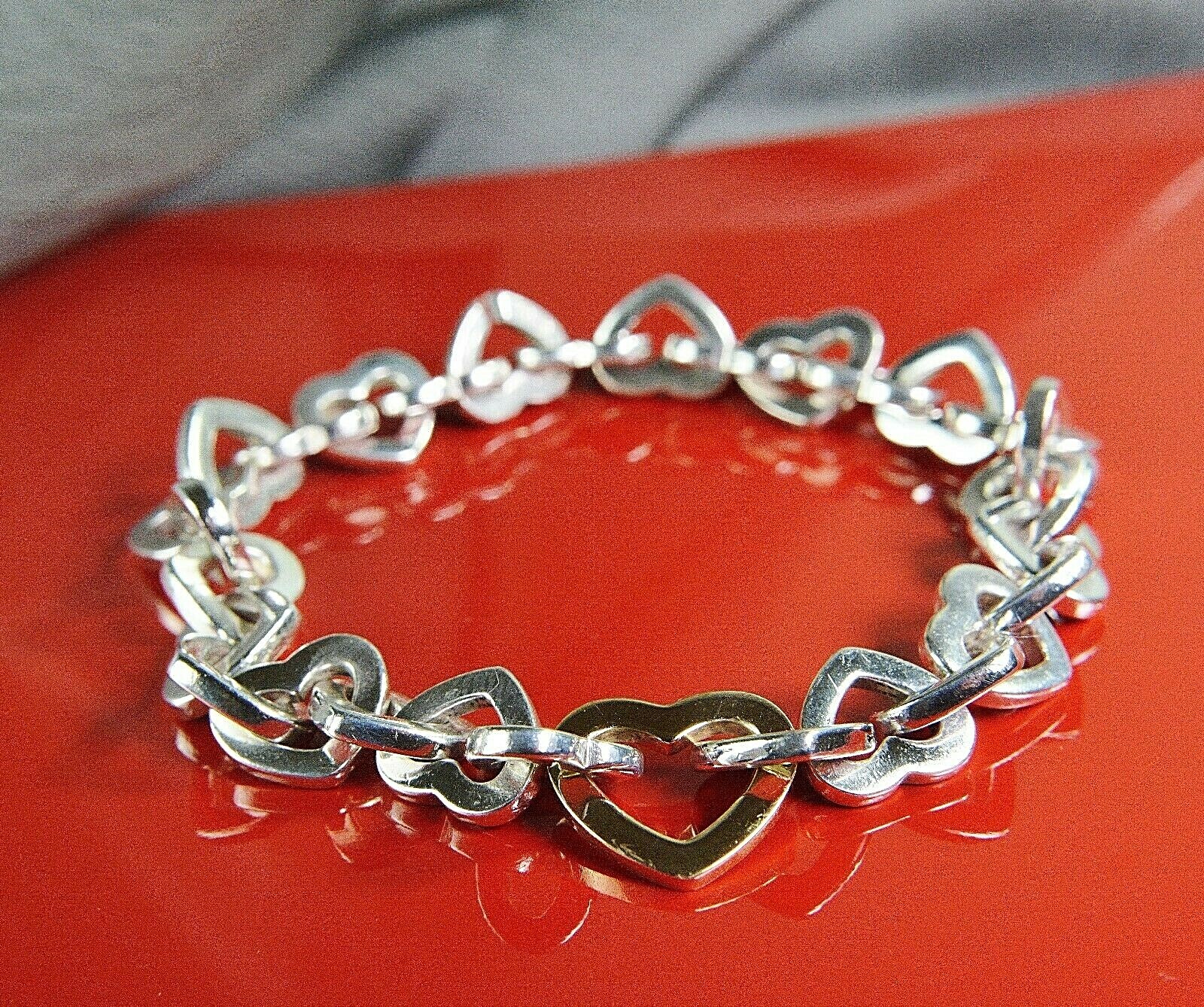 Tiffany & Co Hearts Link Bracelet 925 Sterling & 18k yellow Tiffany & Co Hearts Link Bracelet 925 Sterling & 18k yellow