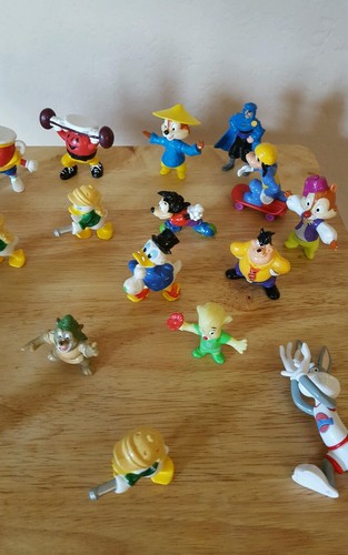 Vintage lot of 24 mixed Plastic Collectible figurines including Goof Troops more