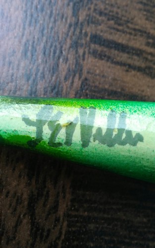 Vintage signed handmade wood green fishing lure.