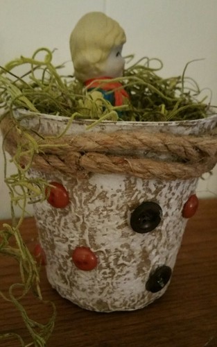 VINTAGE CERAMIC BISQUE FROZEN CHARLOTTE DOLL ~COWGIRL FIGURINE IN NEST BASKET