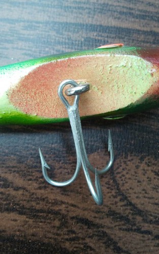 Vintage signed handmade wood green fishing lure.