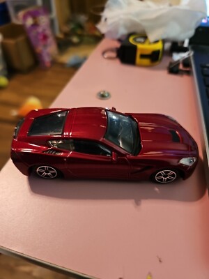 Chevrolet Corvette Stingray Coupe 2014-red metallic 1:43 Burago