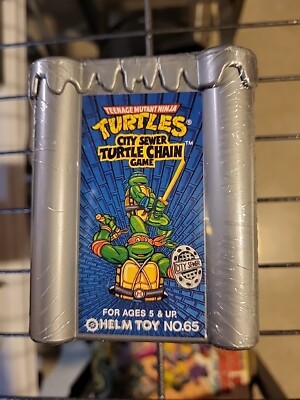 Vintage 1990 Teenage Mutant Ninja Turtles City Sewer Turtle Chain Game NEW
