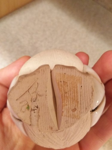hand carved wooden goose with marble wings and ceramic beak. 5'' tall x 4'' wide