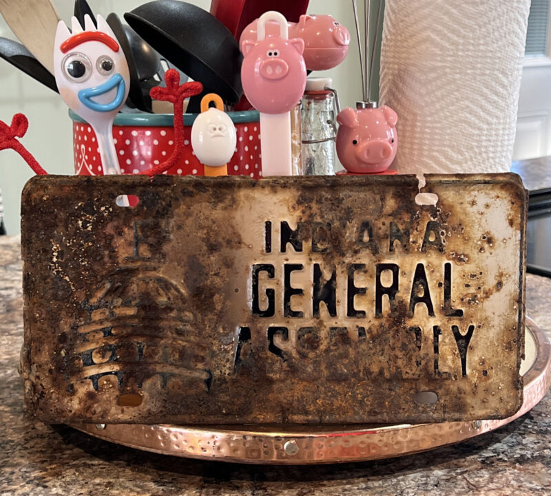 Vintage 1960s Indiana General Assembly Booster License Plate EMBOSSED Rusty Gold