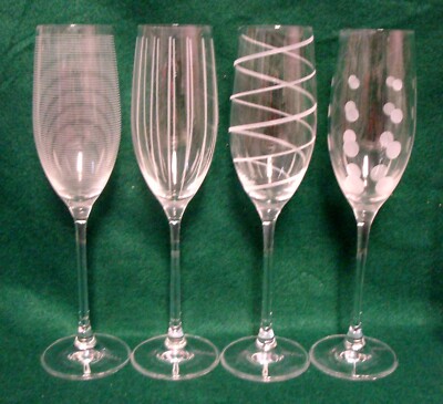 Mikasa CHEERS Champagne Flutes   SET OF FOUR DESIGNS   MINT IN BOX
