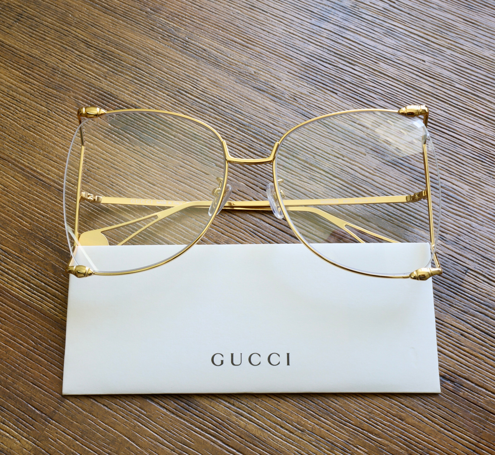 Gucci GG0252S 001 63mm Butterfly Sunglasses in Gold/Clear Gucci GG0252S 001 63mm Butterfly Sunglasses in Gold/Clear