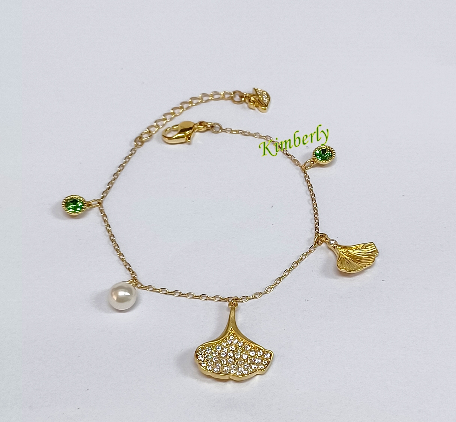 SWAROVSKI　STUNNING GINKO　ゴールドカラー Swarovski Stunning Ginko Bracelet Dangle Leaves Crystal