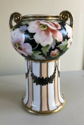 Nippon hand painted vase with beautiful floral and scenic designs.