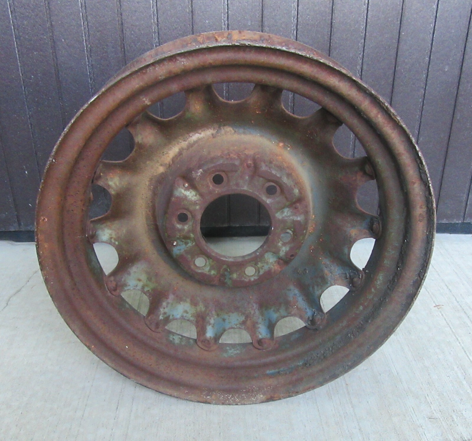 Vehicle iron wheel (6 log nuts) car, truck, man cave great decor