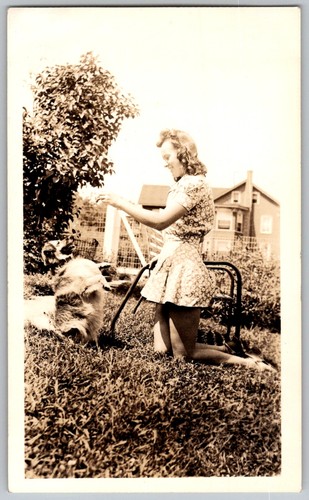Vtg B&W Snapshot Pretty Woman Kneeling in Grass Playing With Dog 1940s