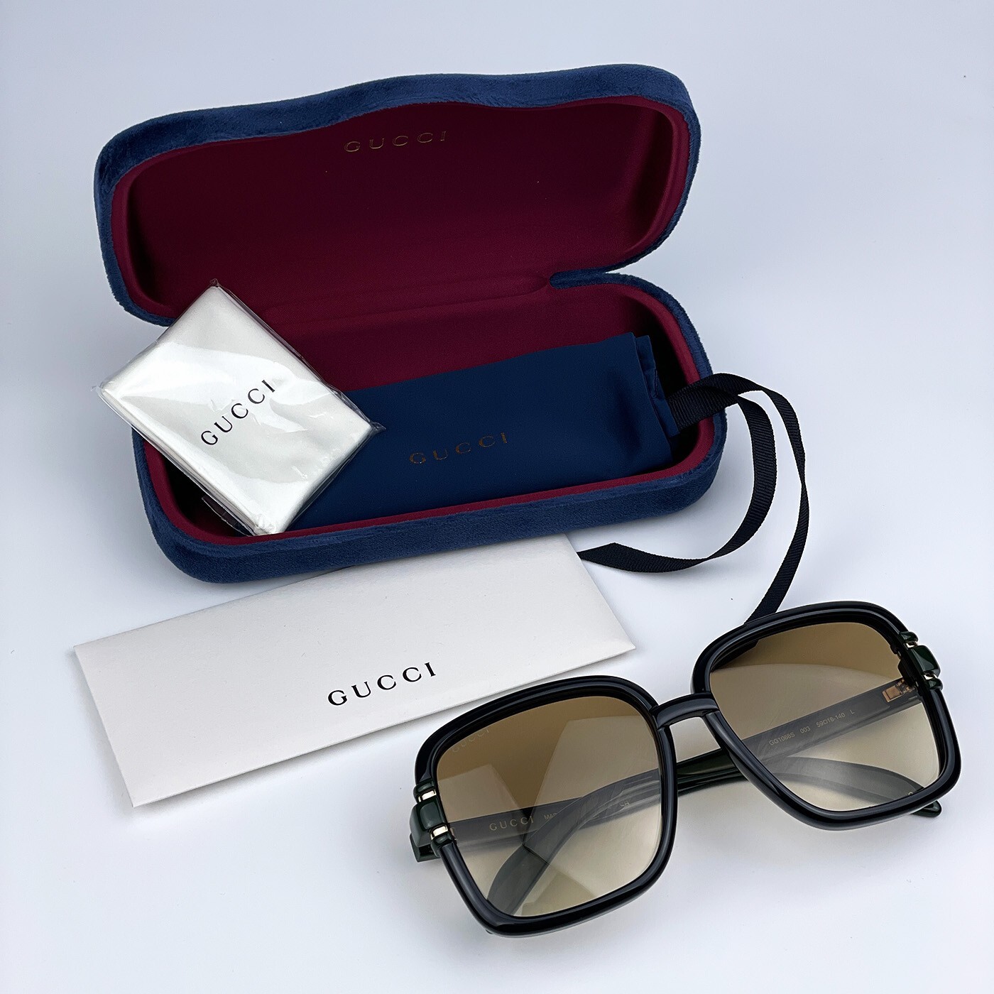 Pre-owned Gucci Gg1066s 003 Black Green Brown Gradient Butterfly Women Sunglasses
