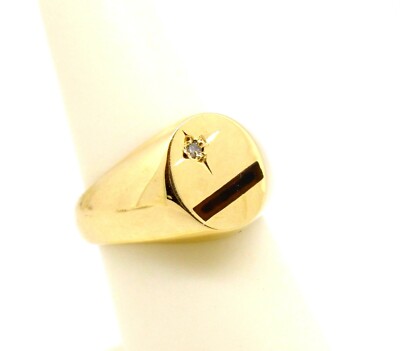 Ring 10k yellow gold oval top Black Onyx strip with .02 ct