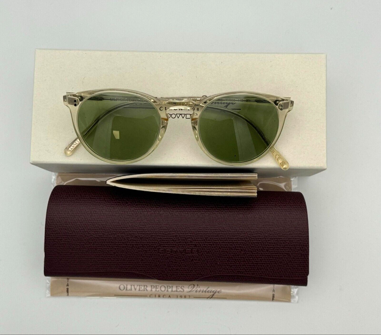 Pre-owned Oliver Peoples O'malley Sun Ov5183s 109452 Buff / Green C
