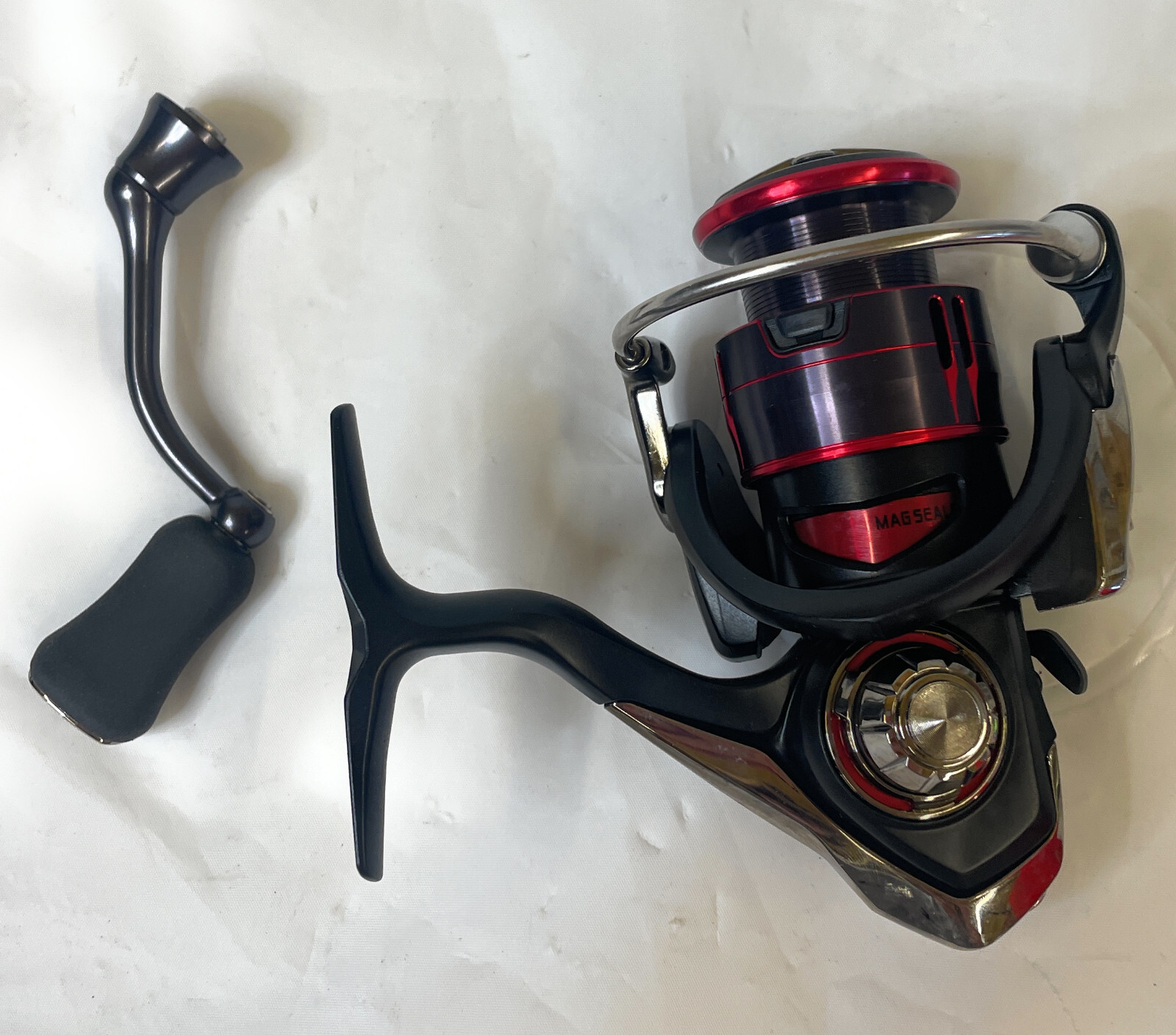 Daiwa Fuego LT 1000D Saltwater Spinning Fishing Reel, Black/Red Daiwa Fuego LT 1000D Saltwater Spinning Fishing Reel, Black/Red
