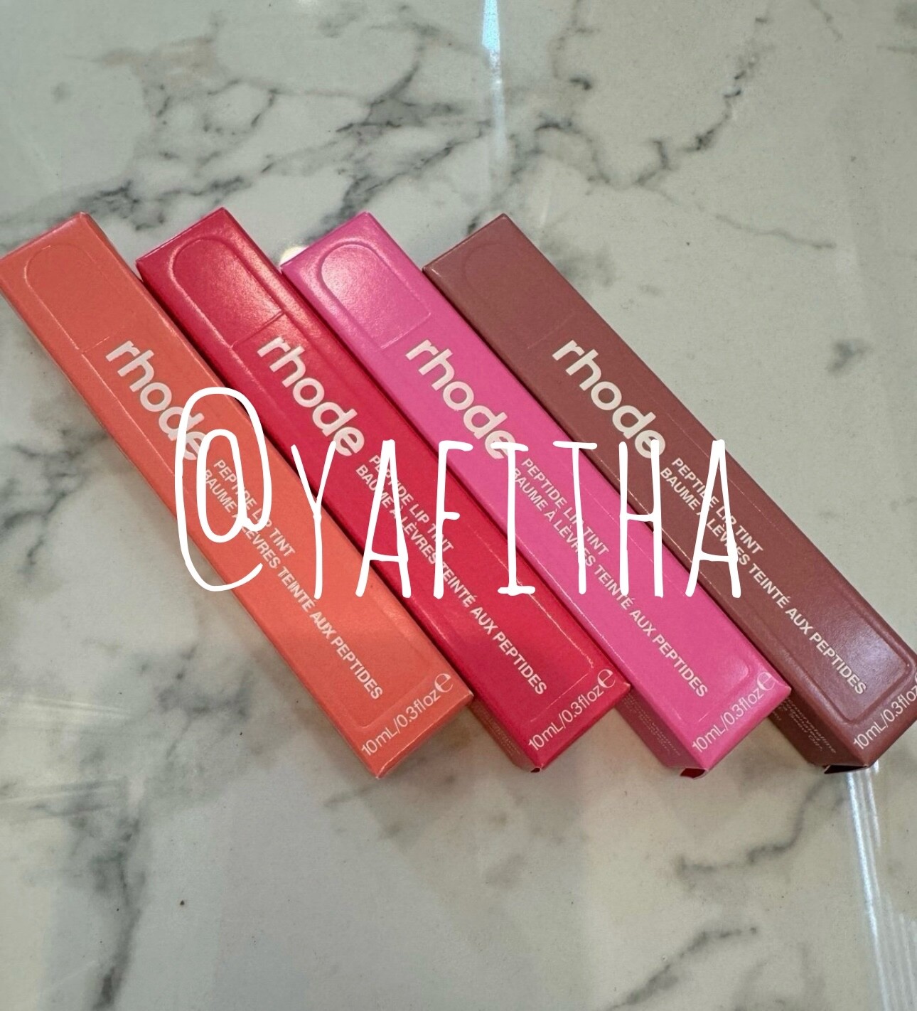 。。。rhode THE SUMMER PEPTIDE LIP TINTS Amazon.com : Rhode Peptide Lip Tint, Sheer Color and