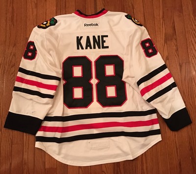 blackhawks military jersey auction