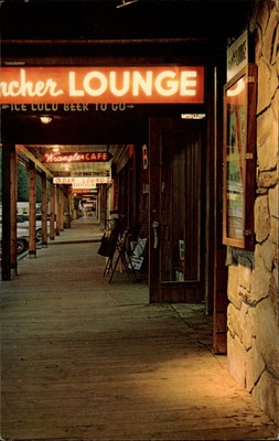 Wyoming Jackson Rancher Lounge Wrangler Cafe night neon ~ postcard  sku083