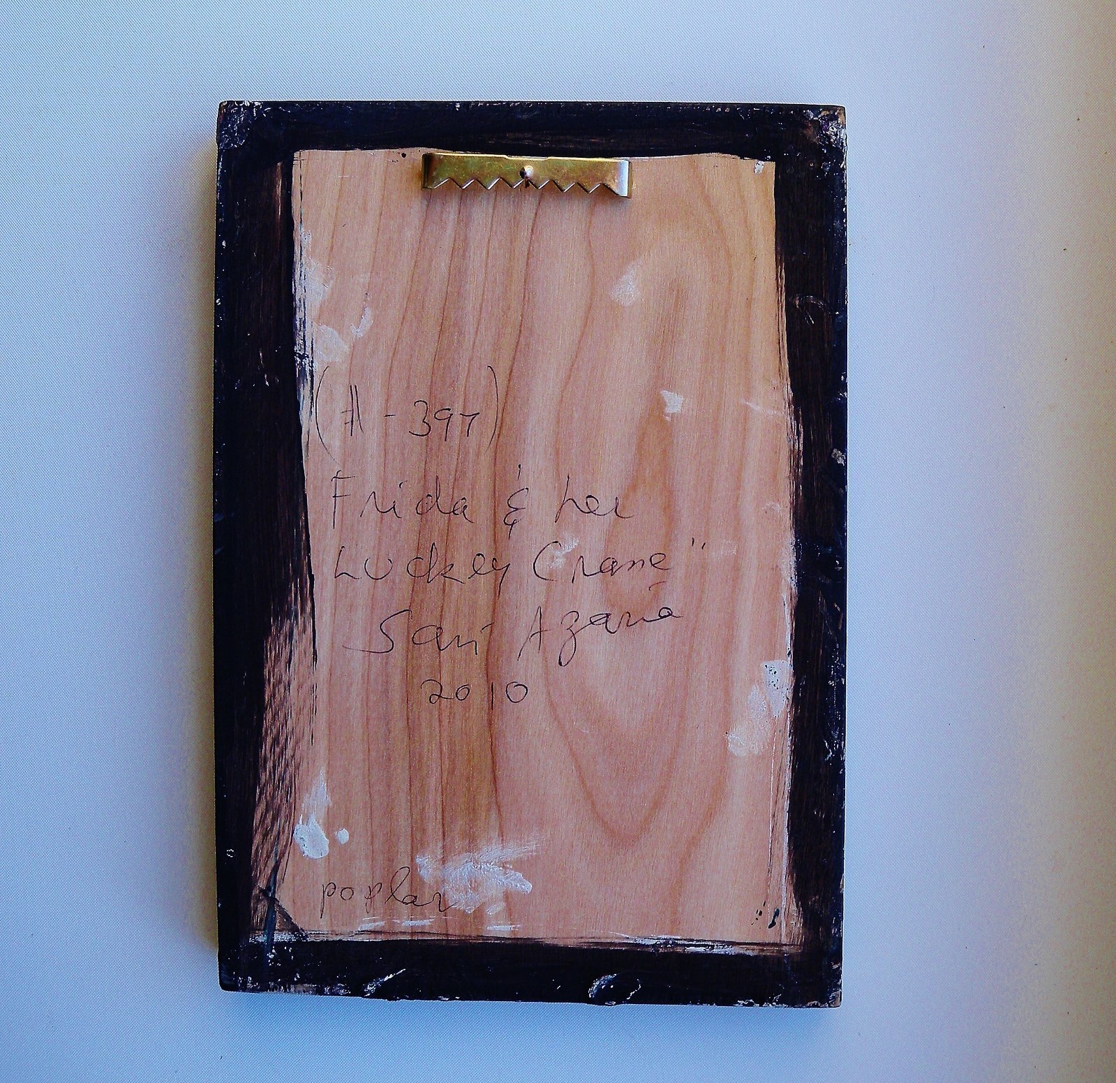 Folk Art Painting of Frida Kahlo plus Milagro Mexican Cross