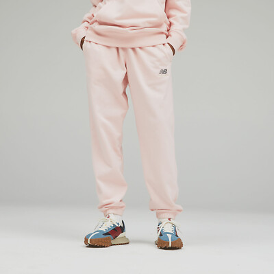 

Мужские и женские розовые спортивные штаны New Balance унисекс Essentials Pants, Розовый, New Balance Essentials Pants