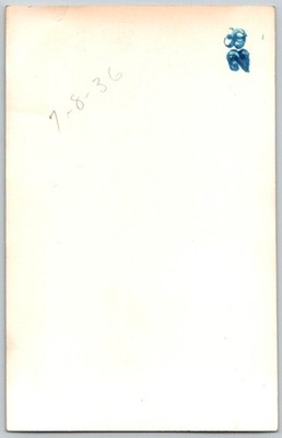 Vtg B&W Snapshot Dapper Man In Tie & White Shoes Leaning On Railing By Sign 1936 — additional view