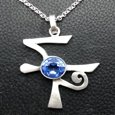 MJG STERLING SILVER EYE OF HORUS PENDANT. LAB AQUAMARINE