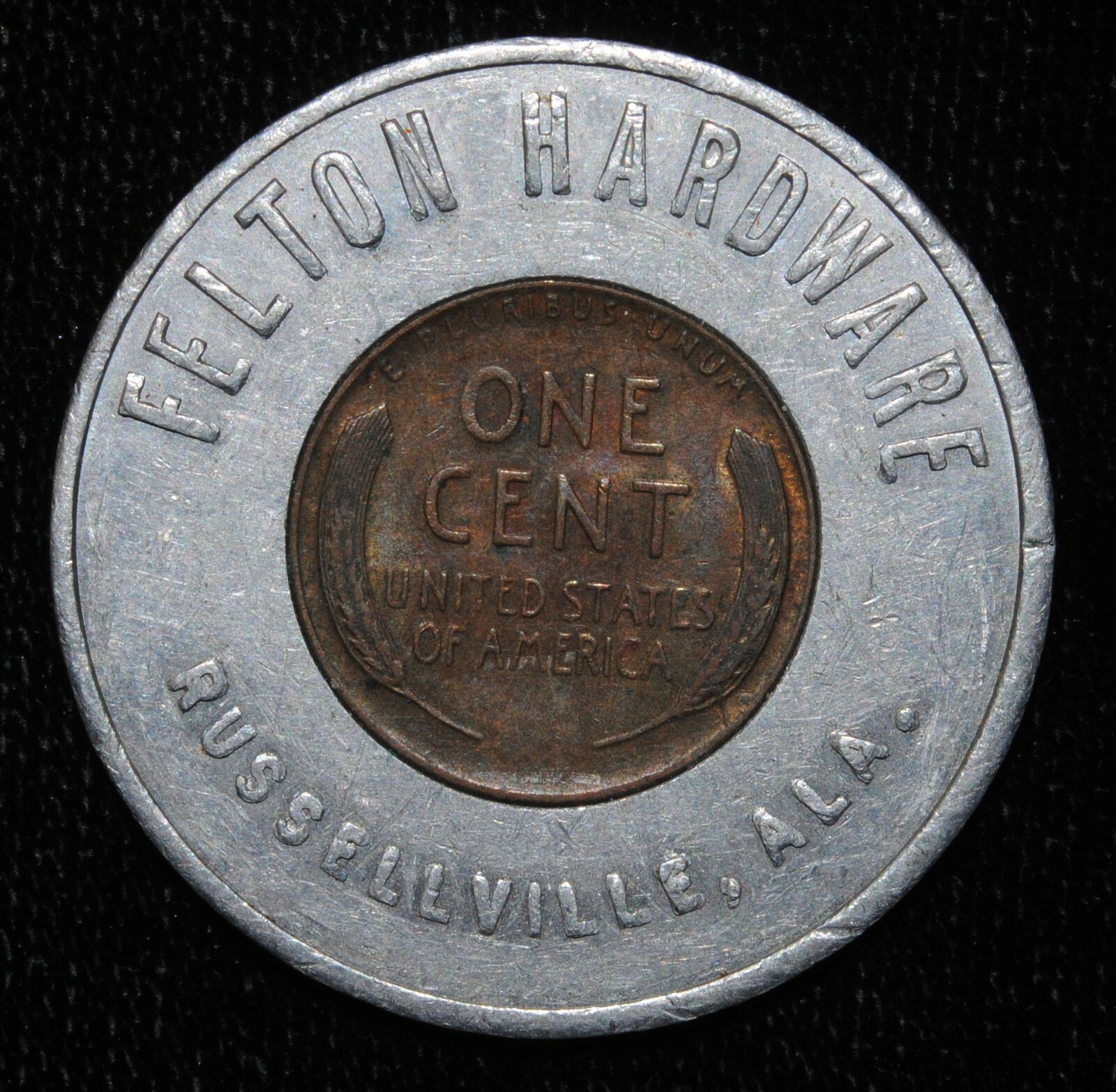 1957-D FELTON HARDWARE RUSSELLVILLE AL ENCASED LINCOLN CENT (03172)