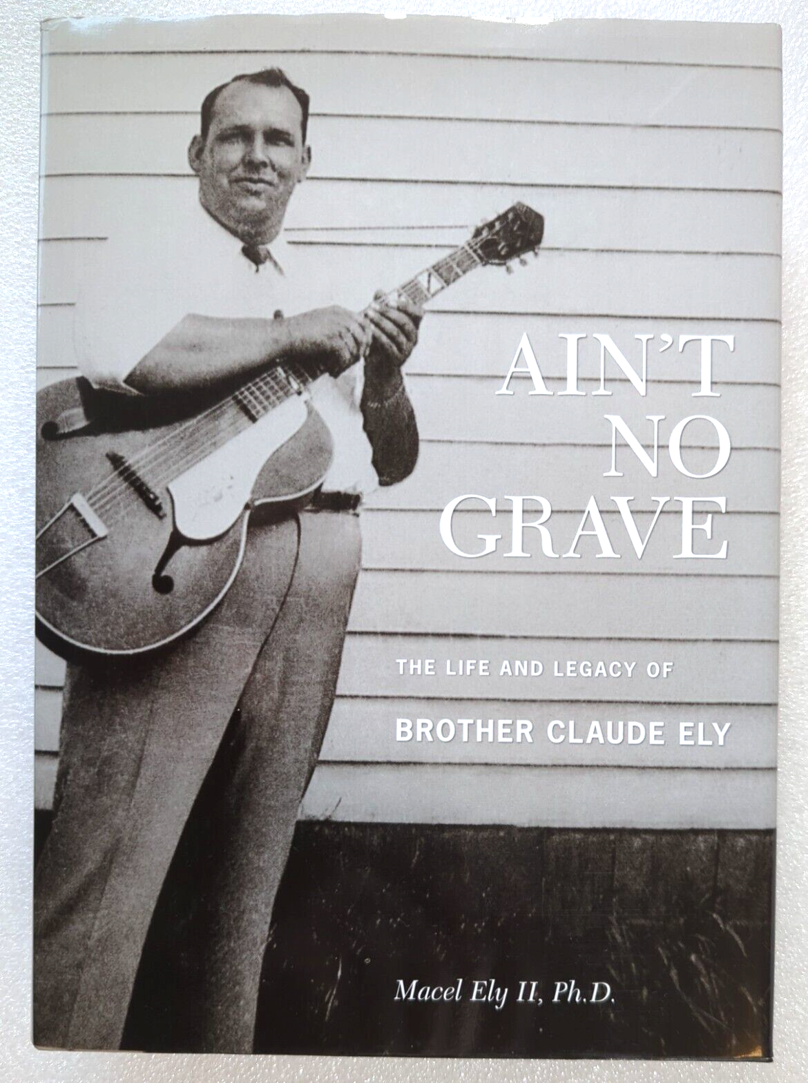 Ain't No Grave The Life And Legacy Of Brother Claude Ely by Macel Ely II Ph.D