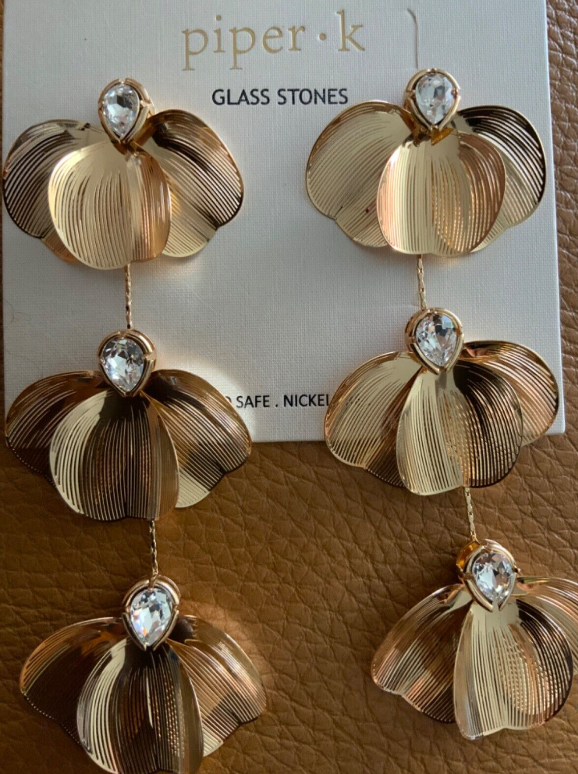 Piper.k 3D flower drop earrings in gold tone 4” long lead