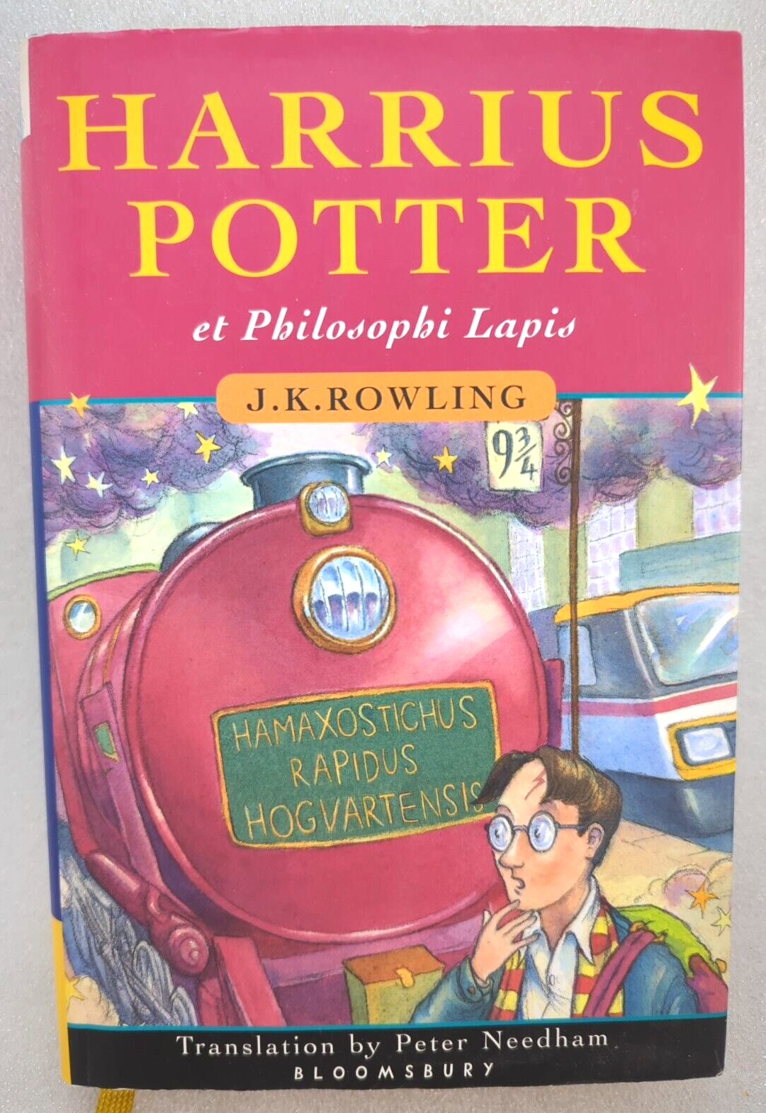 Harrius Potter Et Philosophi Lapis by J.K. Rowling