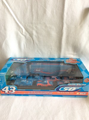 50TH ANNIV. PETTY TRANSPORTER 1/64 7 PETTY CHAMPIONSHIP CARS RACING CHAMPION