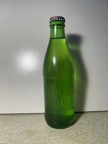 Full 10 Oz. Embossed Mountain Dew Green Soda Bottle, No