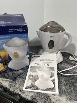 Oster 3186 Juice-n-Serve 27-Ounce Automatic Citrus Juicer White 