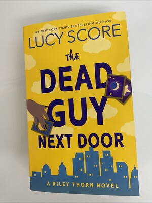 The Dead Guy Next Door : A Riley Thorn Novel by Lucy Score