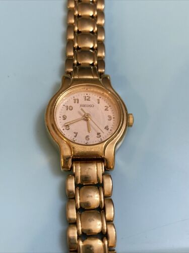 VTG 80's Seiko Ladies Quartz Watch GoldTone White Dial V401 VTG 80's Seiko Ladies Quartz Watch GoldTone White Dial V401
