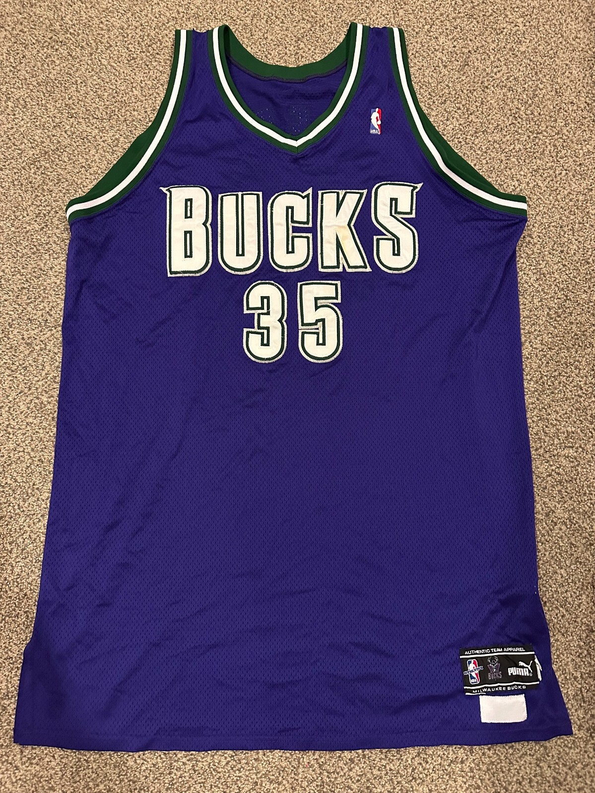 Jason Caffey 00-01 Bucks playoff game worn purple Puma Jason Caffey 00-01 Bucks playoff game worn purple Puma