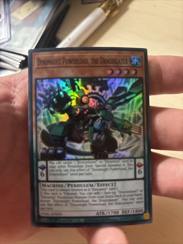 Yu-Gi-Oh! Karte: Dinomight Powerload, The Dracoslayer – DABL-EN024 – Super Rare – 1st Edition – Aus Darkwing Blast