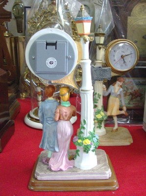 Man/ Lady Under Lamp Post Clock Works Great