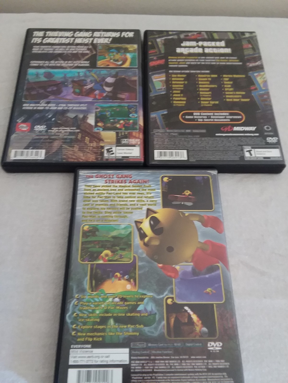 PlayStation 2 Games (Lot Of 3)  Pac-Man World 2, Sly 3,& Midway Arcade Treasures