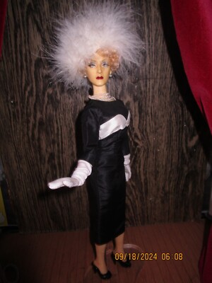 S.S.P Black and White fashion with Feathered Hatitudes Hat.