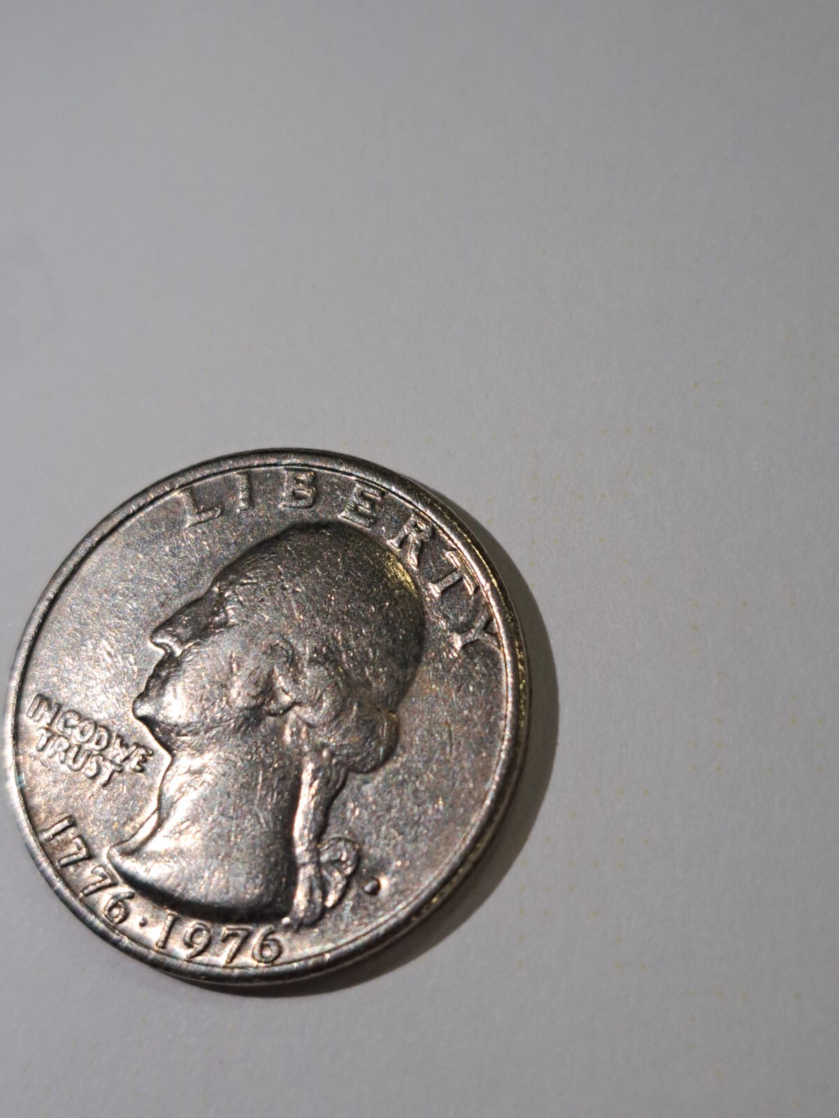 1976 bicentennial quarter FILLED mint mark error looks like