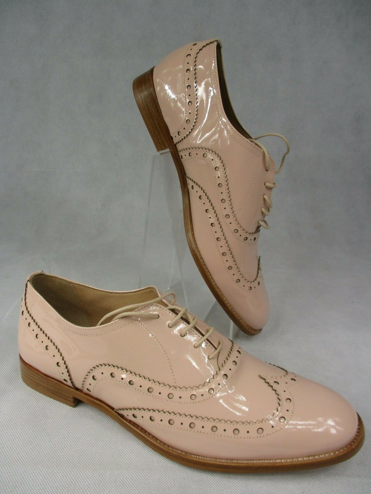 nude patent brogues