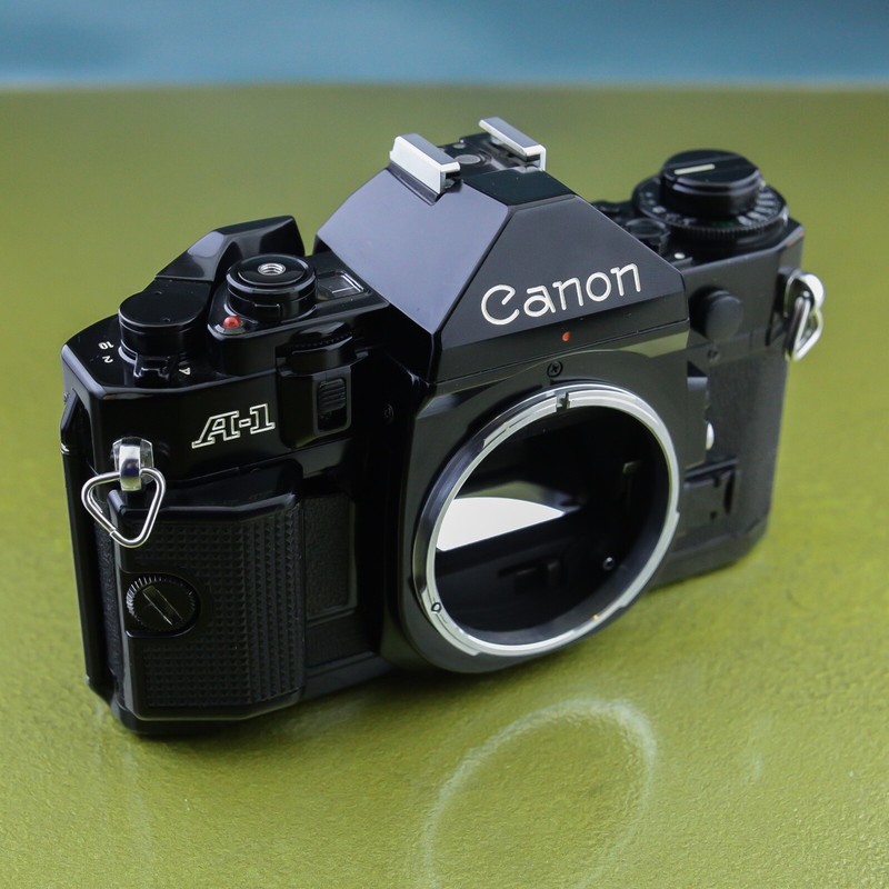Canon A-1 camera body, A1 black 35 mm SLR Japan, power winder