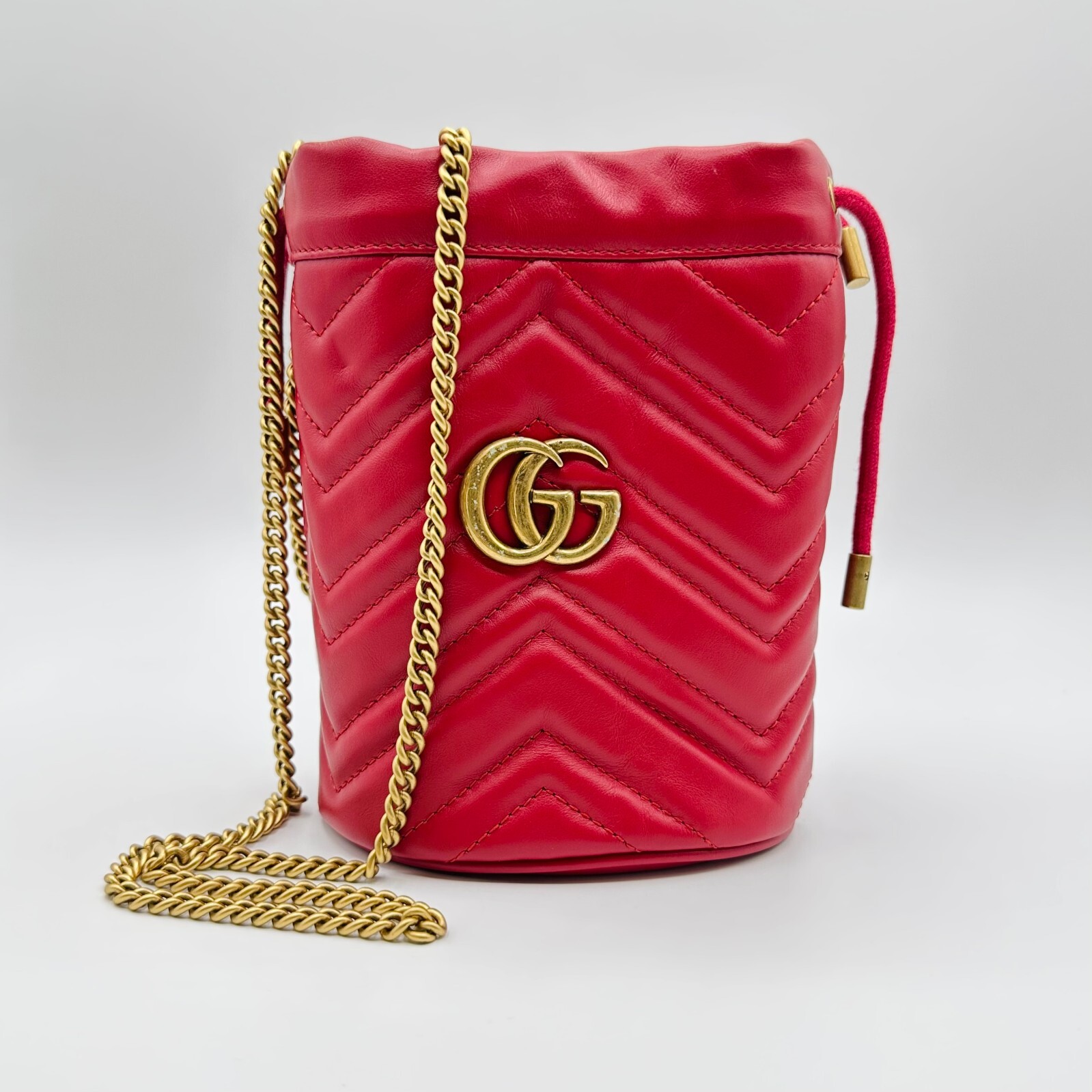 Gucci GG Marmont Matelassé Red Leather Drawstring Bucket