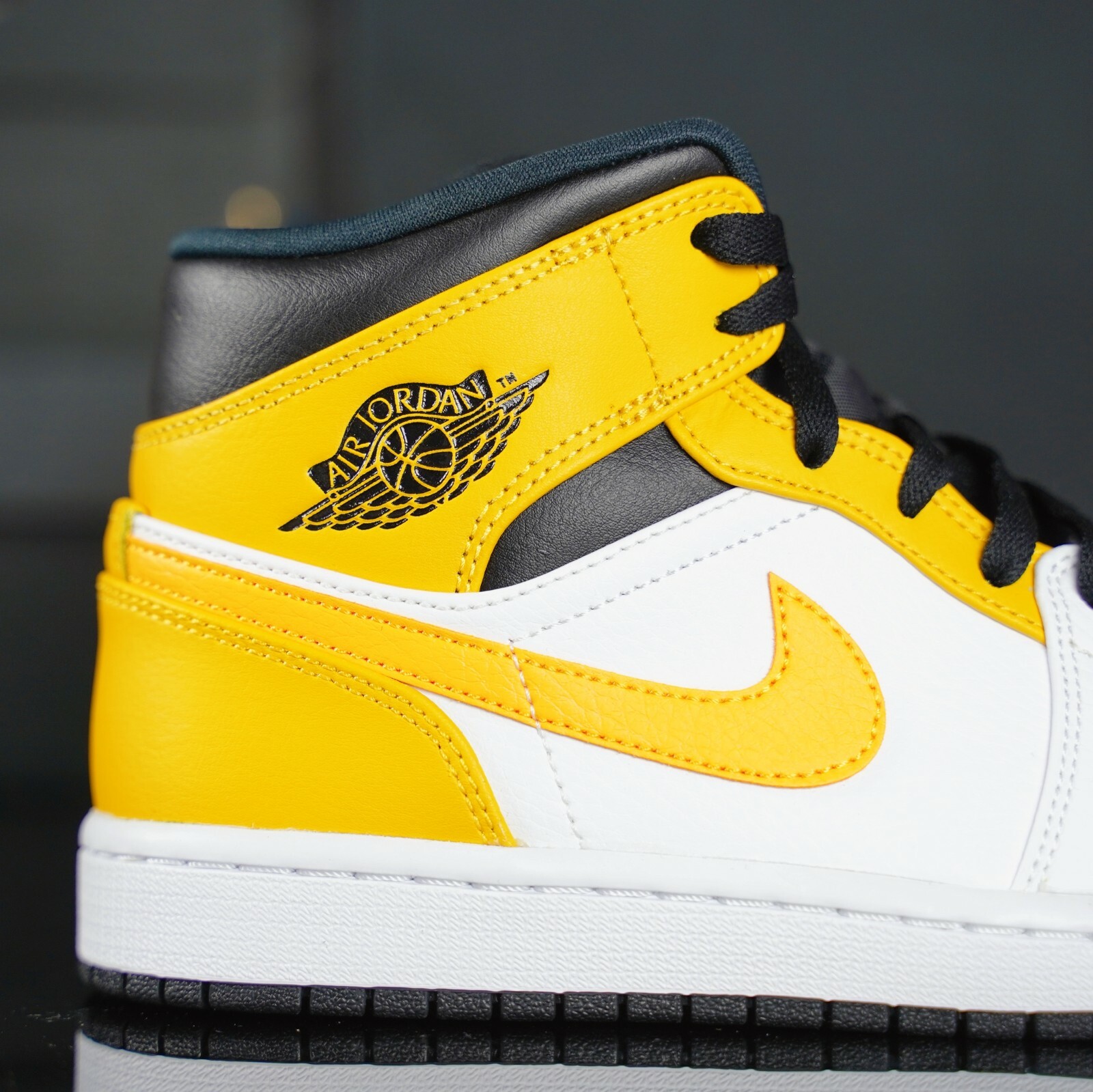 nike jordan mid university gold