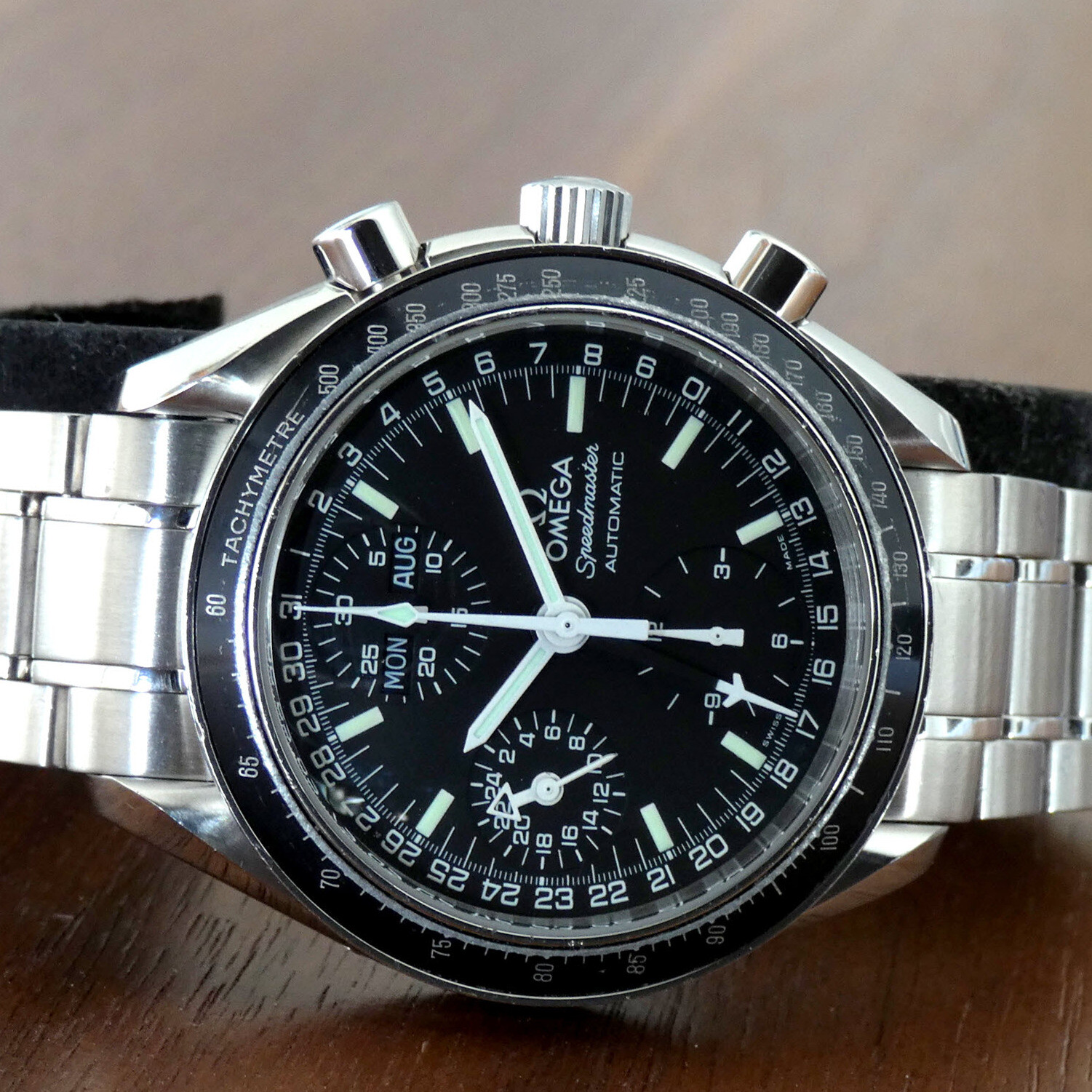 omega speedmaster triple date