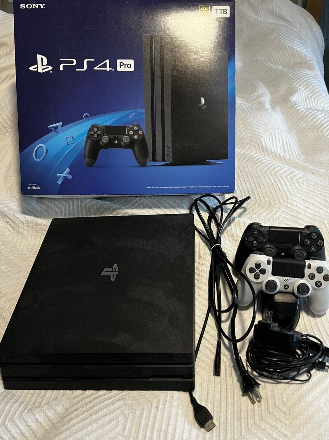 Sony PlayStation 4 PS4 Pro with 2 controllers and charging